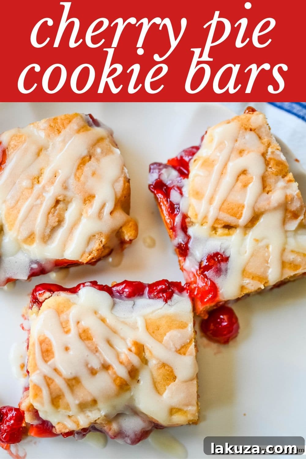 A stunning vertical shot of Cherry Pie Bars, showing the cookie base, thick cherry layer, and crumble topping with icing.