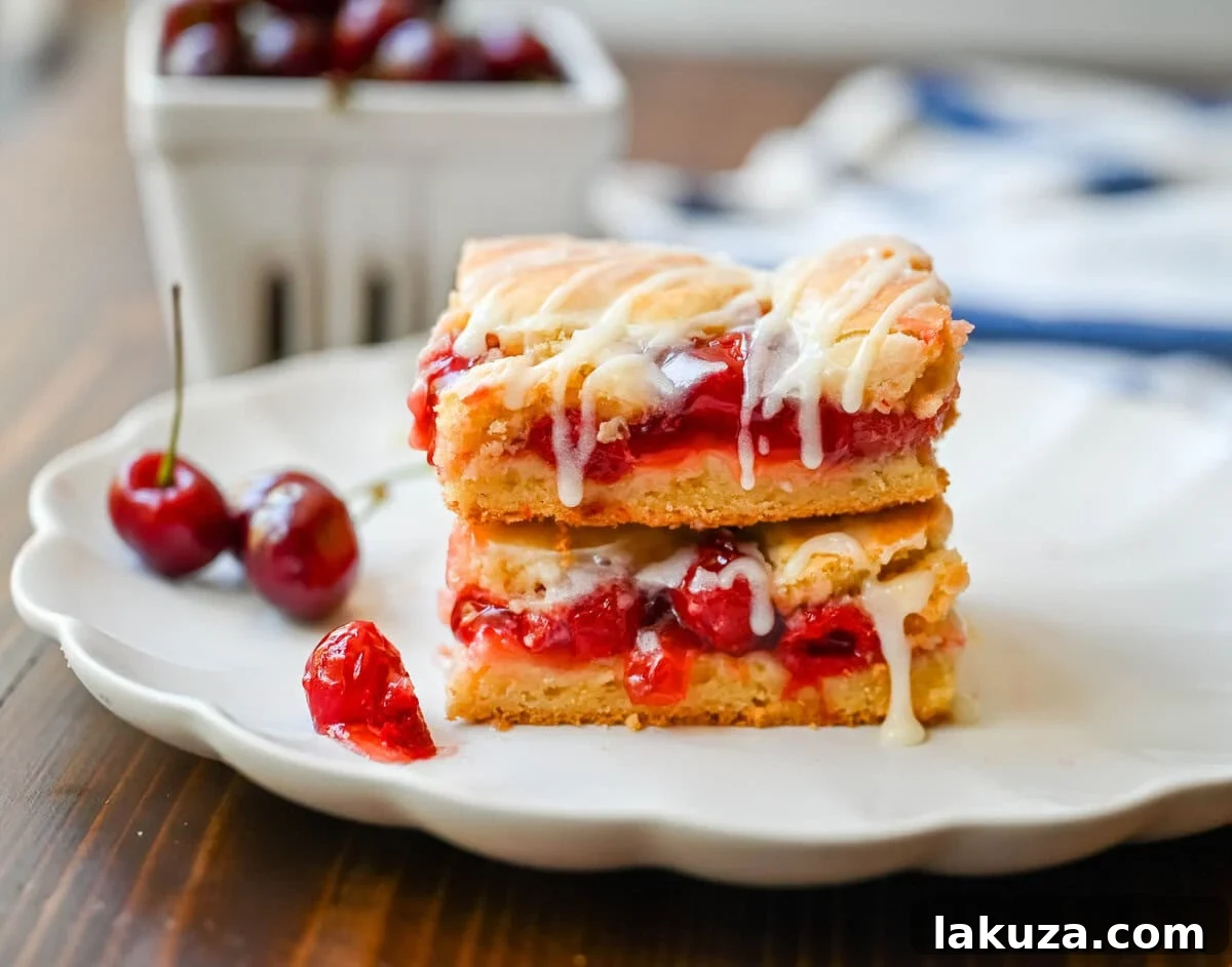 Ingredients for making homemade Cherry Pie Bars, including cherry pie filling and cookie dough components.