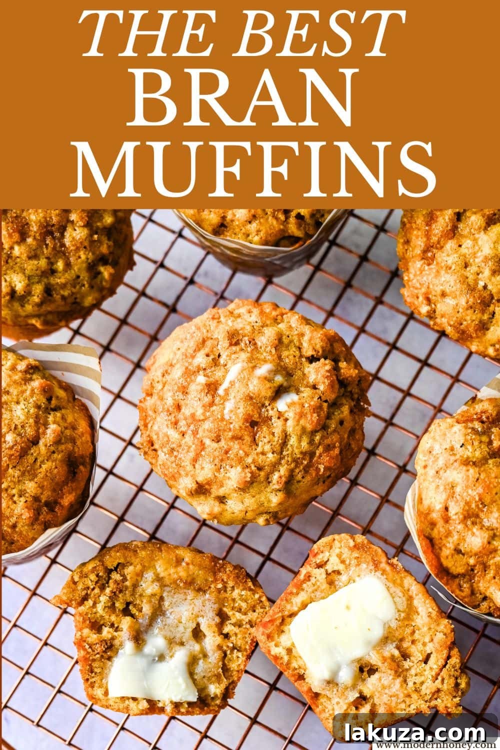 A close-up of a single perfectly baked bran muffin, showing its moist interior
