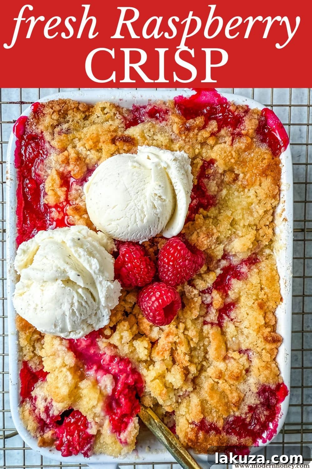 Golden Raspberry Delight 7 Close-up of a serving of raspberry crisp with a fork, ready to eat.