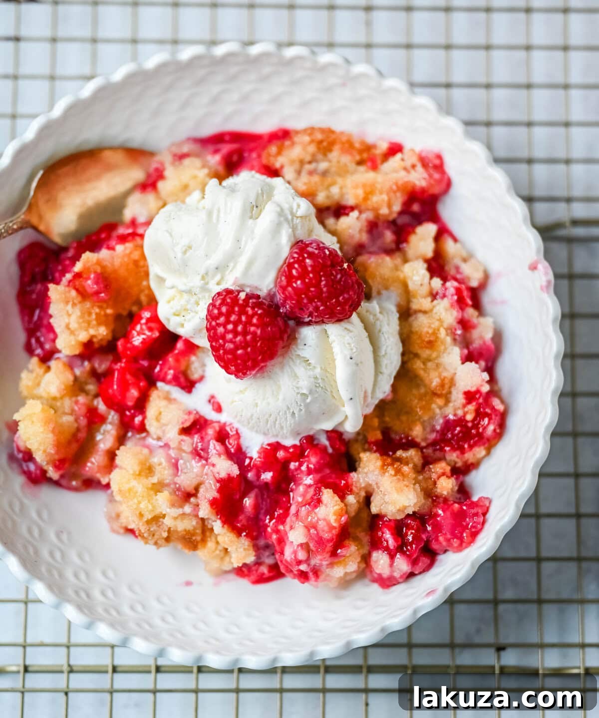 Golden Raspberry Delight 5 Ingredients for raspberry crisp laid out on a kitchen counter.