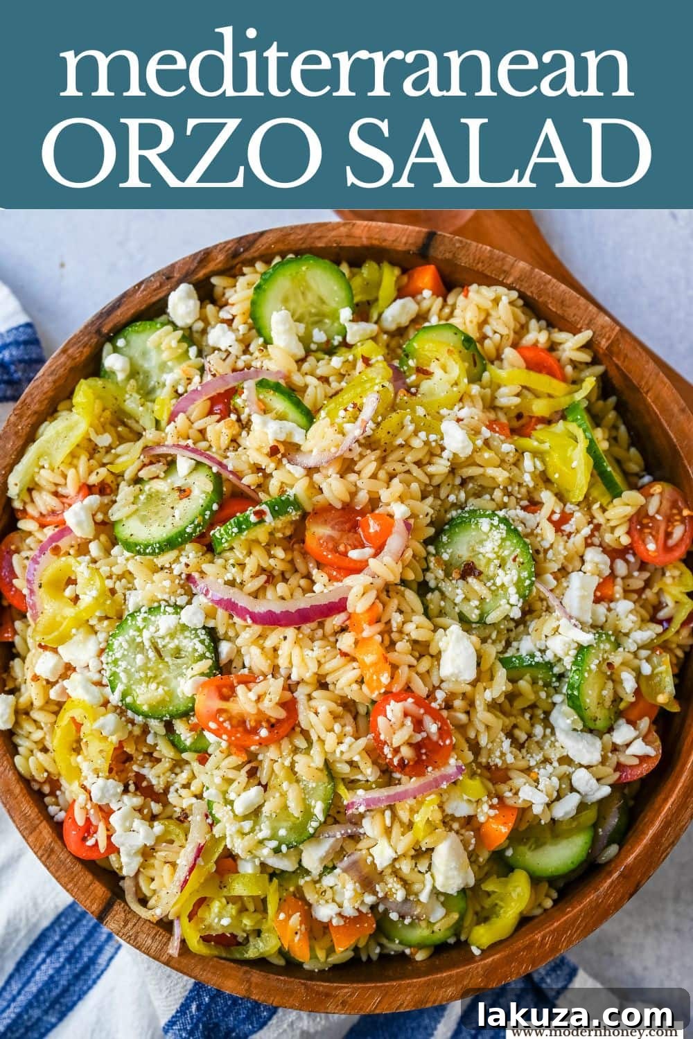 Fresh Mediterranean Orzo Salad made with a bright greek oregano dressing, orzo pasta, crisp cucumber, cherry tomatoes, red onion, feta cheese, and pepperoncinis. This greek orzo pasta salad recipe is perfect for summer or meal prep!