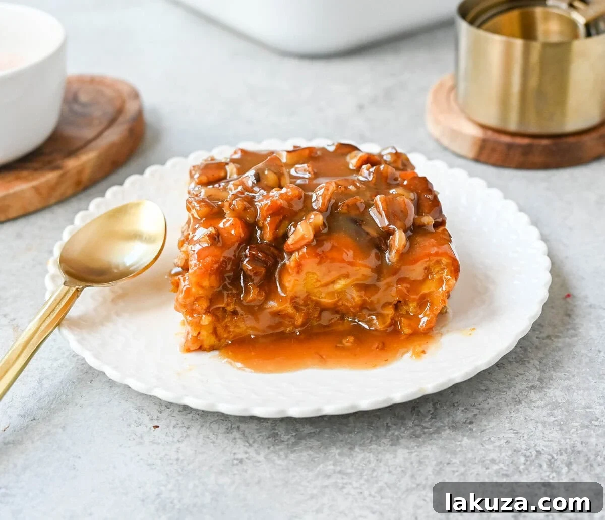This Pumpkin Praline Bread Pudding is made with brioche bread, homemade pumpkin spice custard and baked until perfectly golden and then topped with a caramel butter pecan sauce. This Pumpkin Bread Pudding with Caramel Pecan Sauce is the perfect Fall comfort food dessert.