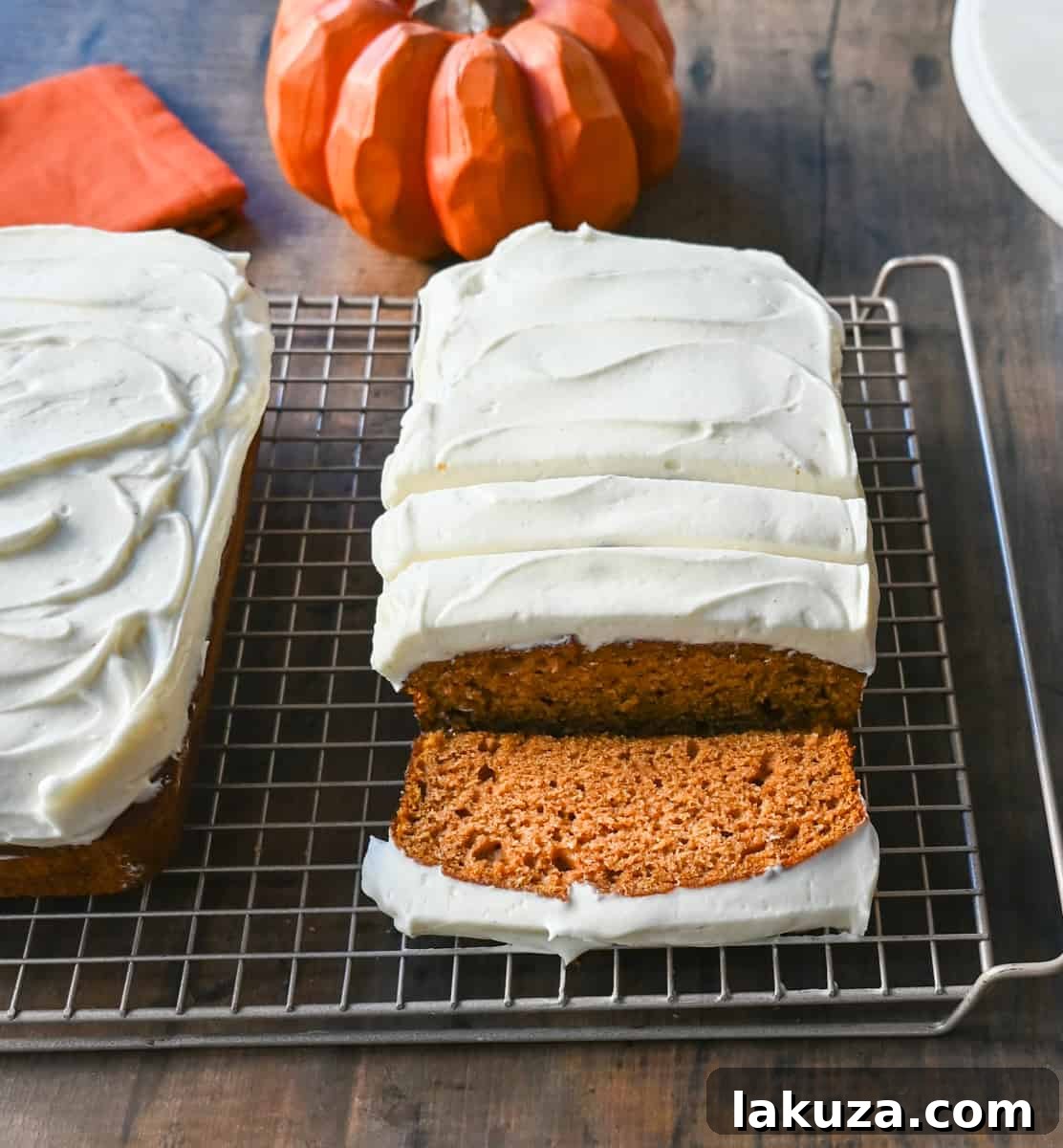 Frosted Pumpkin Loaf with Cream Cheese Frosting. Moist, soft pumpkin spice loaf topped with homemade cream cheese frosting. This frosted pumpkin bread is the perfect Fall treat.