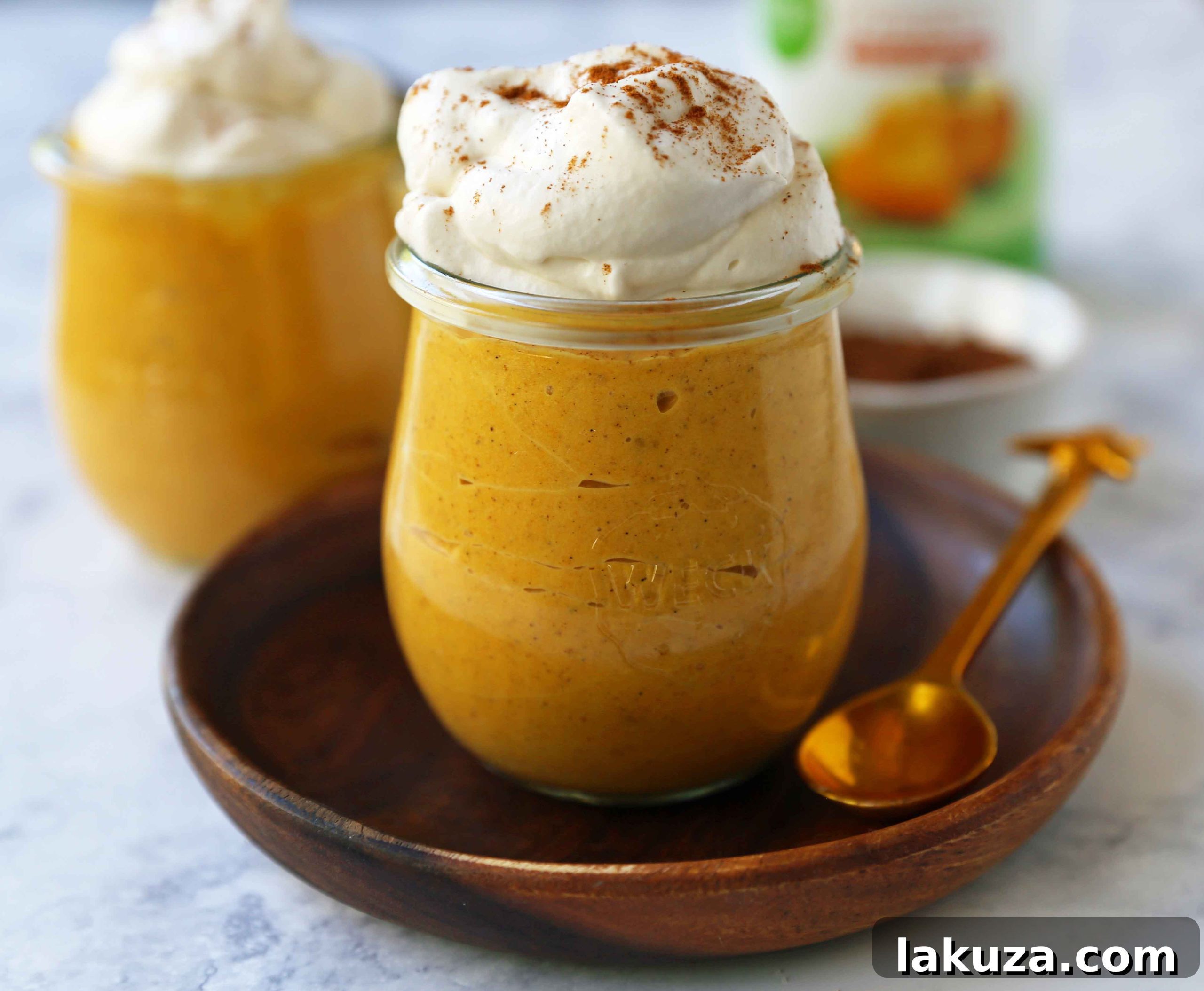 Pumpkin Cheesecake Mousse. This no-sugar-added creamy pumpkin cheesecake mousse is the perfect no-bake pumpkin dessert. Low-carb pumpkin dessert options. www.modernhoney.com #pumpkin #pumpkinmousse #pumpkindessert #ketofriendly #ketodessert