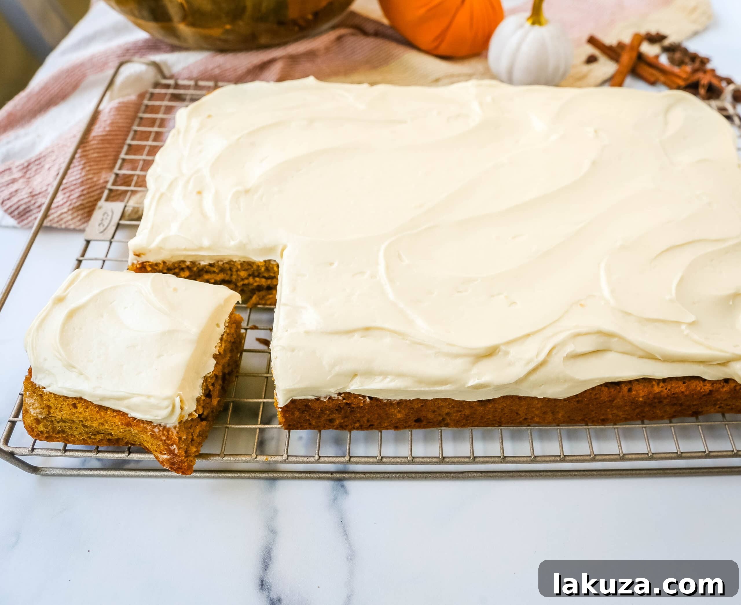 Pumpkin Bars with Cream Cheese Frosting are moist, pumpkin spiced bars topped with homemade sweet cream cheese frosting. The best pumpkin bar recipe!