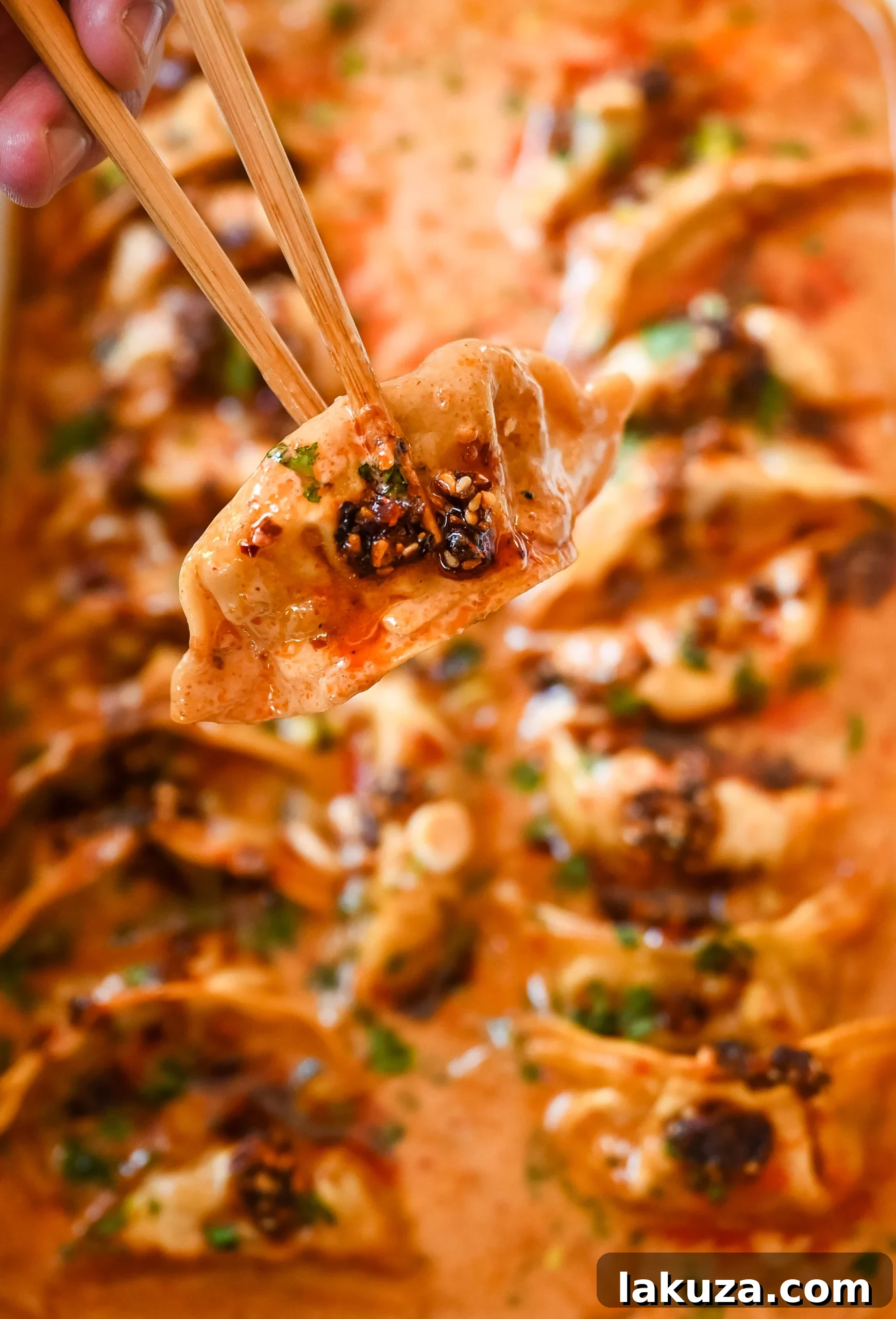 Golden Baked Dumplings 3 These viral baked dumplings from TikTok are the ultimate easy dinner hack! Crispy dumplings are baked in a creamy coconut curry sauce and topped with cilantro, chili crunch oil, and sesame seeds for the perfect mix of flavor and texture. This is an easy sheet pan dinner recipe!
