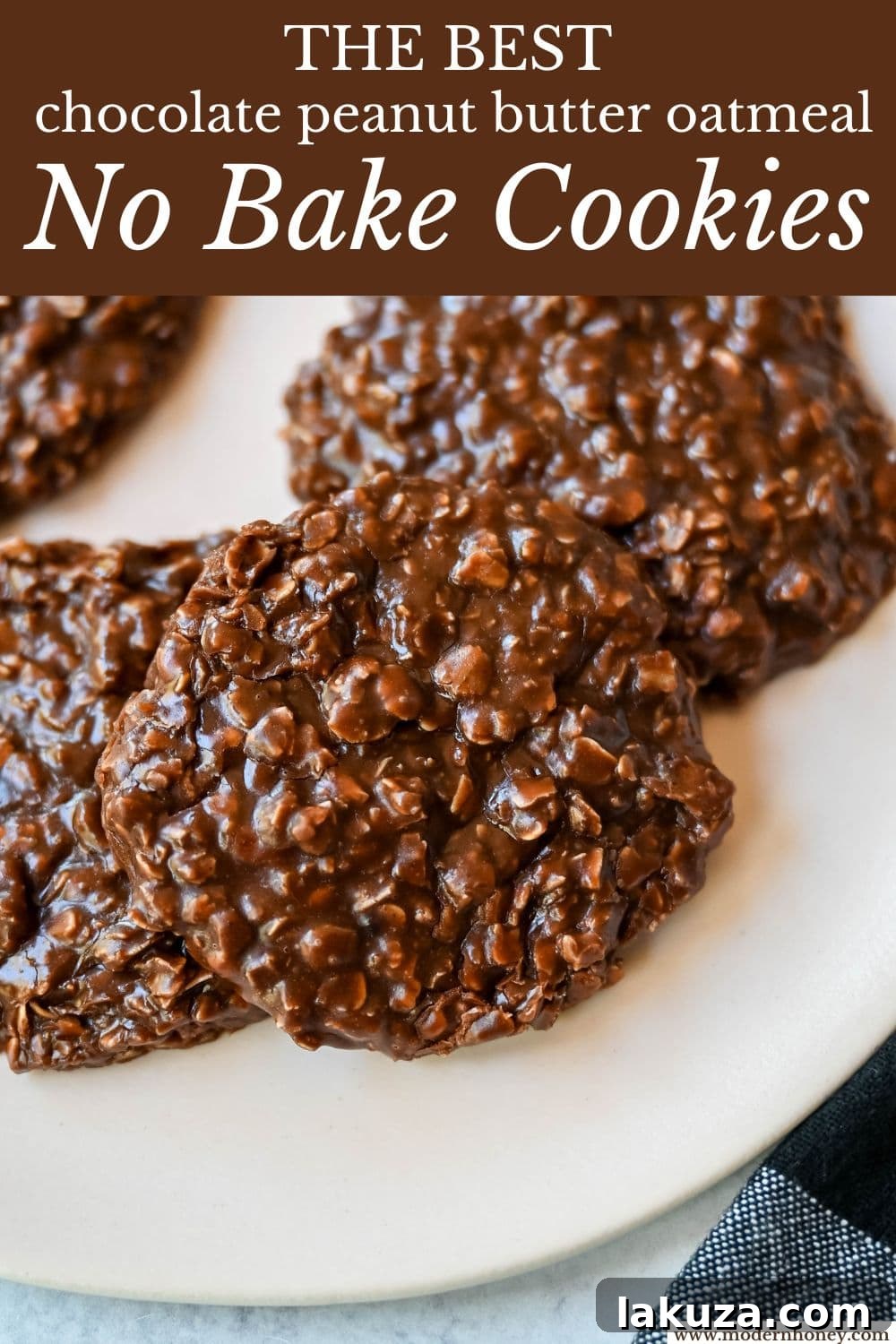 A hand reaching for a freshly made no-bake cookie from a stack, emphasizing their irresistible appeal and ease of enjoyment.