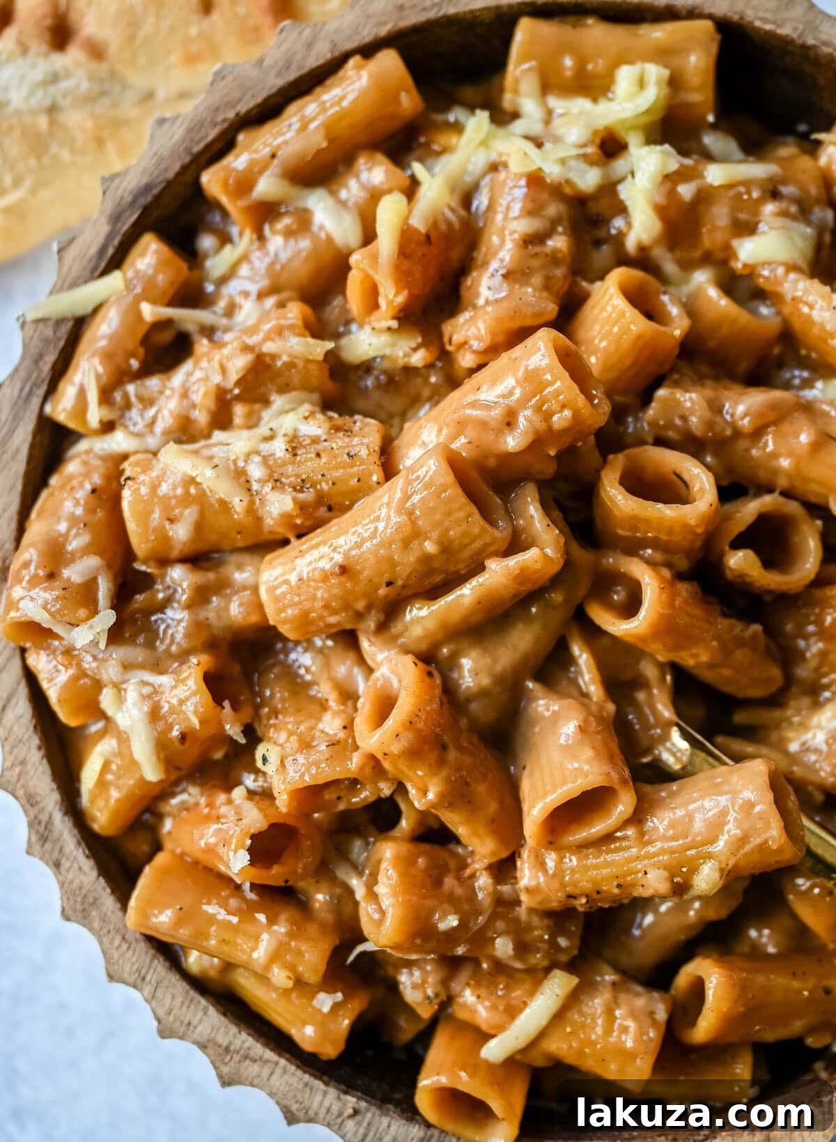 This One Pot French Onion Pasta takes everything you love about French onion soup and turns it into a creamy and cheesy pasta dish. This popular dinner recipe on TikTok is made in just one pot, with caramelized onions, garlic, thyme, and pasta simmered in a savory creamy broth, then topped with Gruyère and Parmesan cheese. 