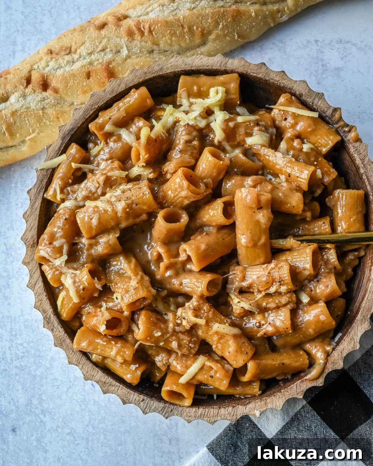 This One Pot French Onion Pasta takes everything you love about French onion soup and turns it into a creamy and cheesy pasta dish. This popular dinner recipe on TikTok is made in just one pot, with caramelized onions, garlic, thyme, and pasta simmered in a savory creamy broth, then topped with Gruyère and Parmesan cheese. 