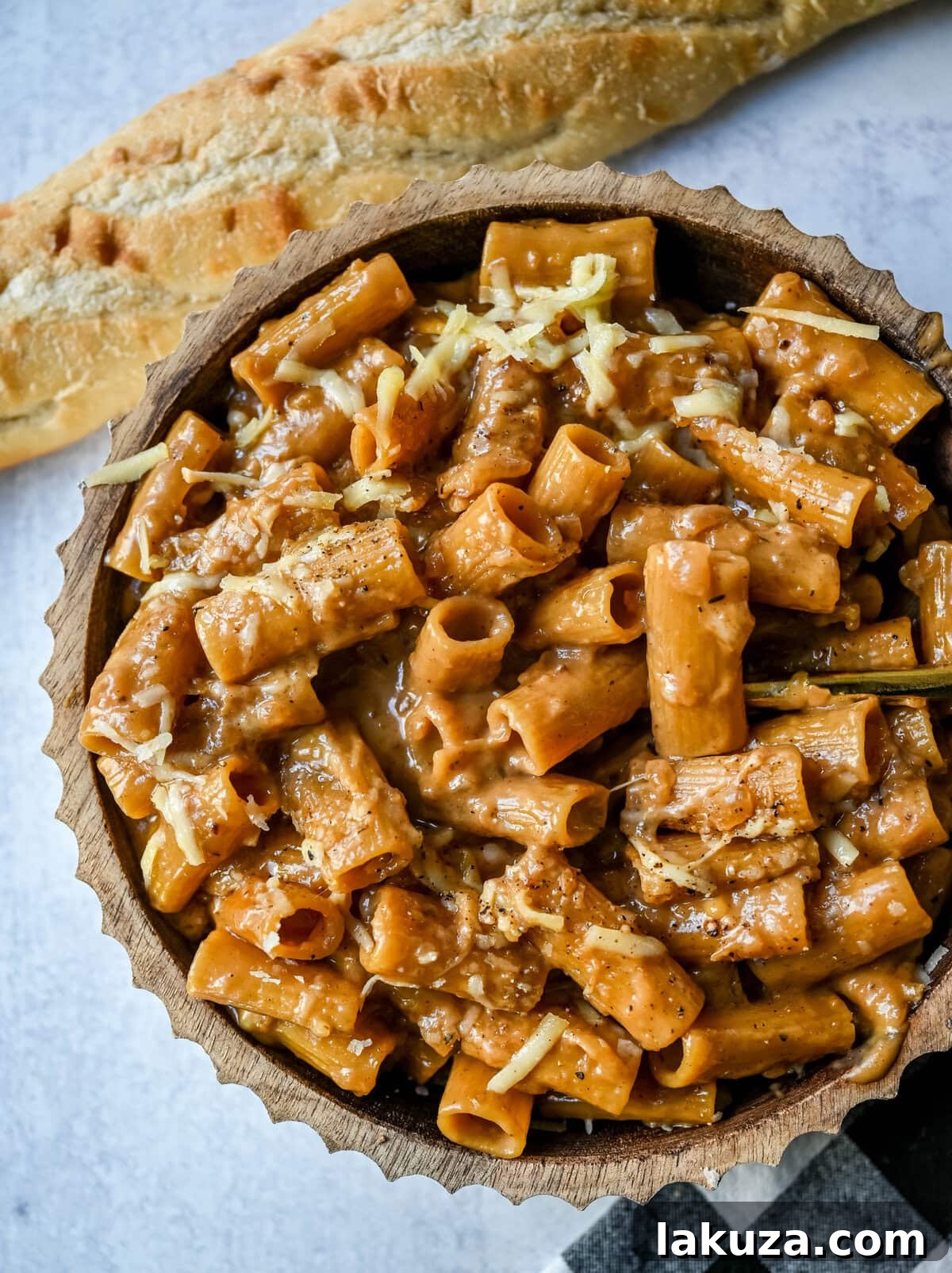 This One Pot French Onion Pasta takes everything you love about French onion soup and turns it into a creamy and cheesy pasta dish. This popular dinner recipe on TikTok is made in just one pot, with caramelized onions, garlic, thyme, and pasta simmered in a savory creamy broth, then topped with Gruyère and Parmesan cheese. 