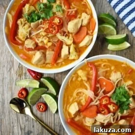 Thai Chicken Noodle Soup. Gluten-free and Dairy-Free nutritious soup that is full of flavor. A rich coconut milk red curry based broth filled with onions, carrots, ginger, cauliflower, and red pepper. A healthy and delicious soup that everyone loves! www.modernhoney.com
