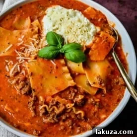 Lasagna Soup. A hearty beef lasagna soup with fresh ricotta cheese, mozzarella, and parmesan cheeses and fresh herbs. An Italian classic made into a comforting soup!