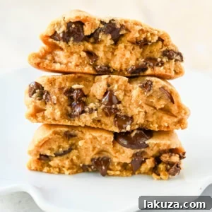 Rich, thick, and soft, these peanut butter chocolate chip cookies taste just like Levain Bakery but made at home. These Levain Bakery Peanut Butter Dark Chocolate Chip cookies are the perfect soft peanut butter chocolate chunk cookie!