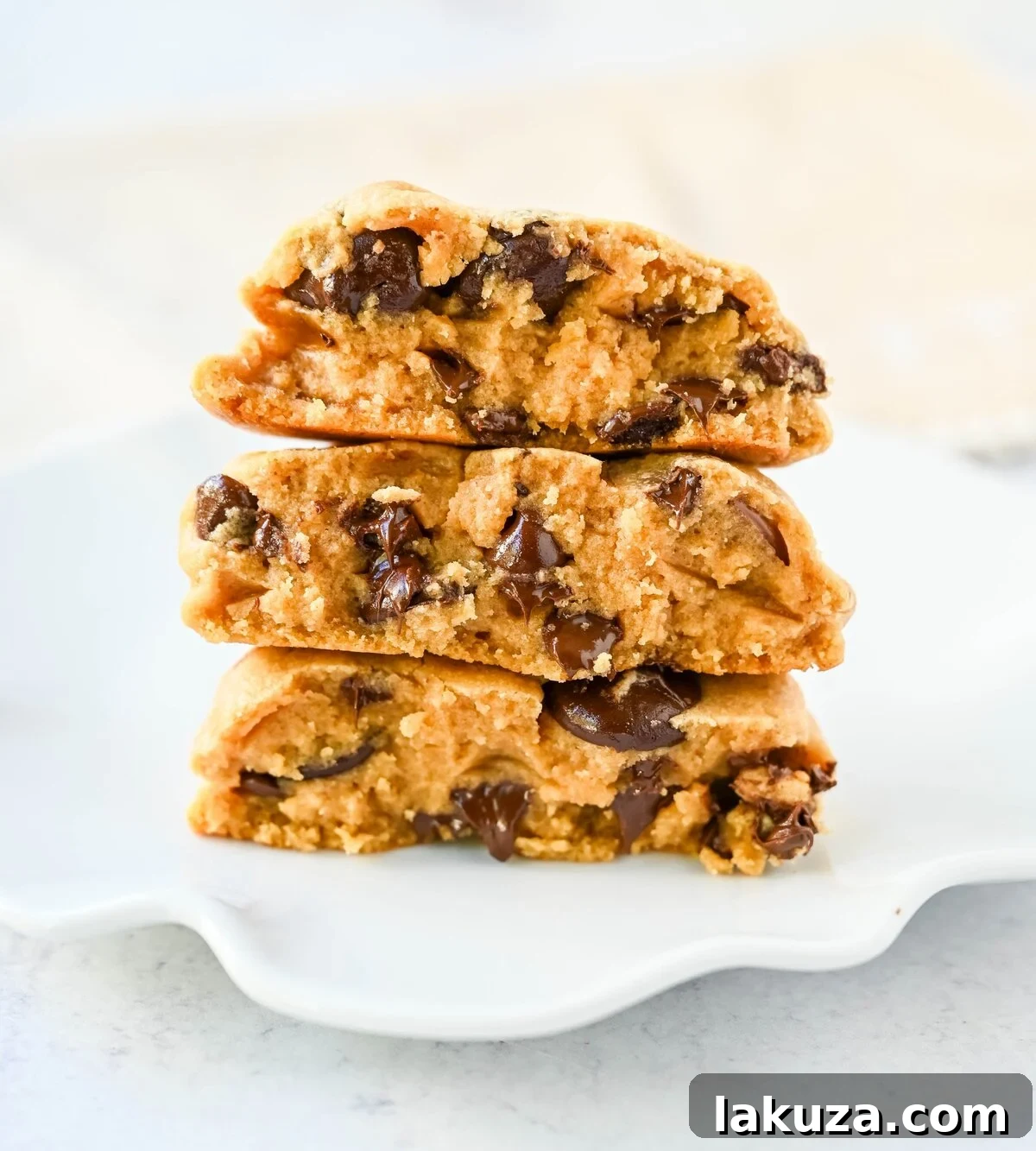 Rich, thick, and soft, these peanut butter chocolate chip cookies taste just like Levain Bakery but made at home. These Levain Bakery Peanut Butter Dark Chocolate Chip cookies are the perfect soft peanut butter chocolate chunk cookie!