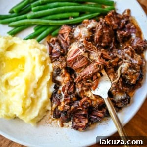 Slow-Cooked French Onion Beef Pot Roast 7 A succulent French Onion Pot Roast, slow-cooked to perfection.