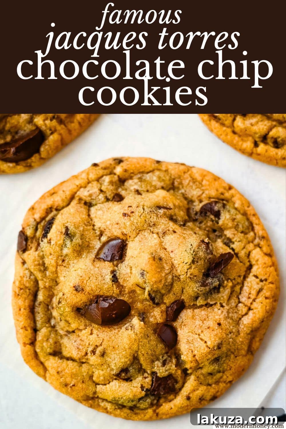 A close-up shot of the irresistible texture and chocolate puddles in a Jacques Torres chocolate chip cookie.