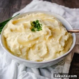 Boursin Cheese Creamy Mashed Potatoes Buttery, creamy homemade mashed potatoes with garlic and herb Boursin cheese. So flavorful, you don't even need the gravy!