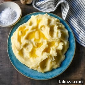 Parmesan Roasted Garlic Mashed Potatoes. Creamy mashed potatoes with roasted garlic and freshly grated parmesan cheese. These flavorful roasted garlic mashed potatoes are such a delicious side dish.