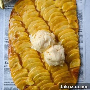Classic French Apple Delight 9 Homemade French Apple Tart with a buttery crust, sliced Granny Smith apples, and apricot glaze.