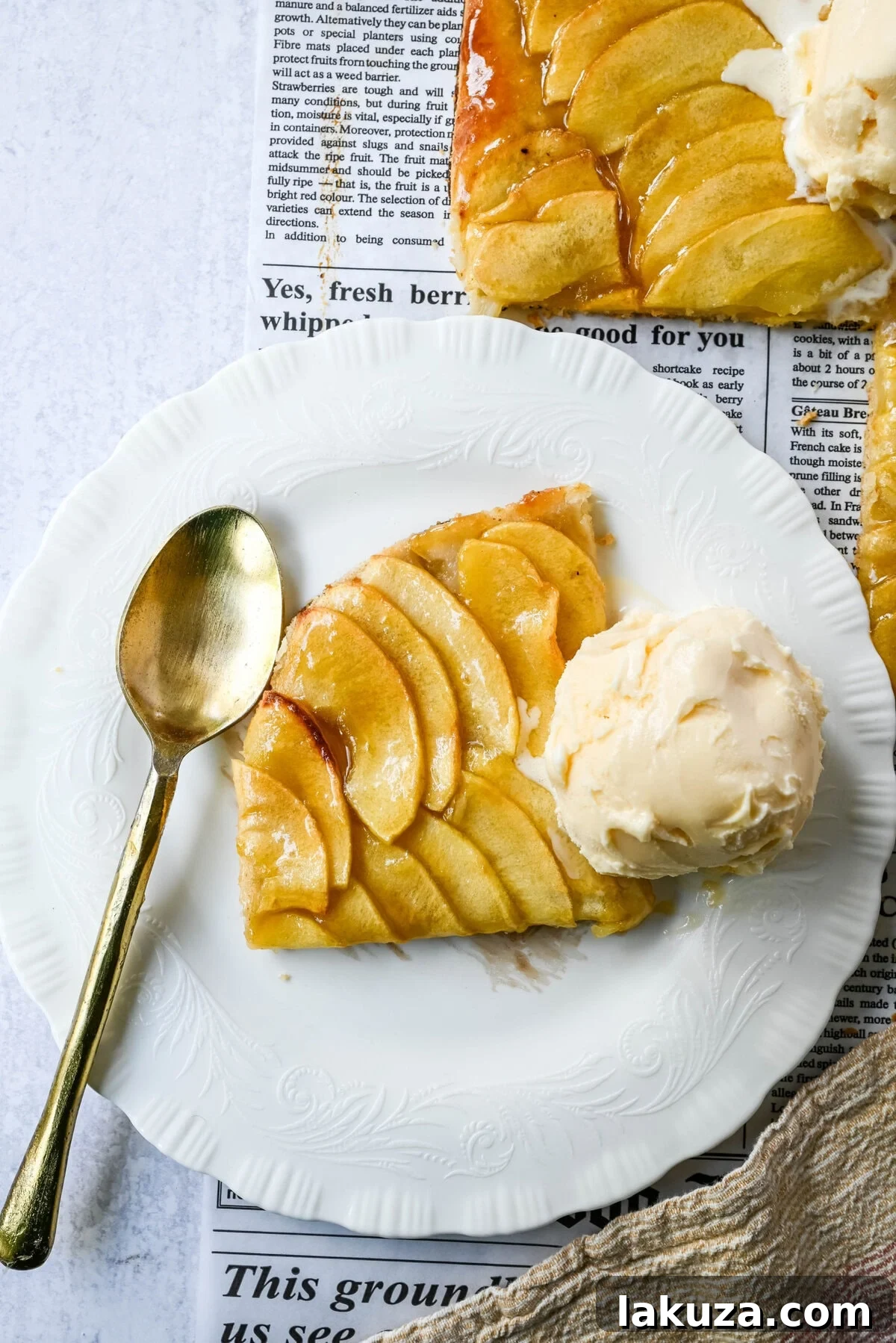 Classic French Apple Delight 3 Close-up of a French Apple Tart showcasing the neatly arranged apple slices and golden crust.