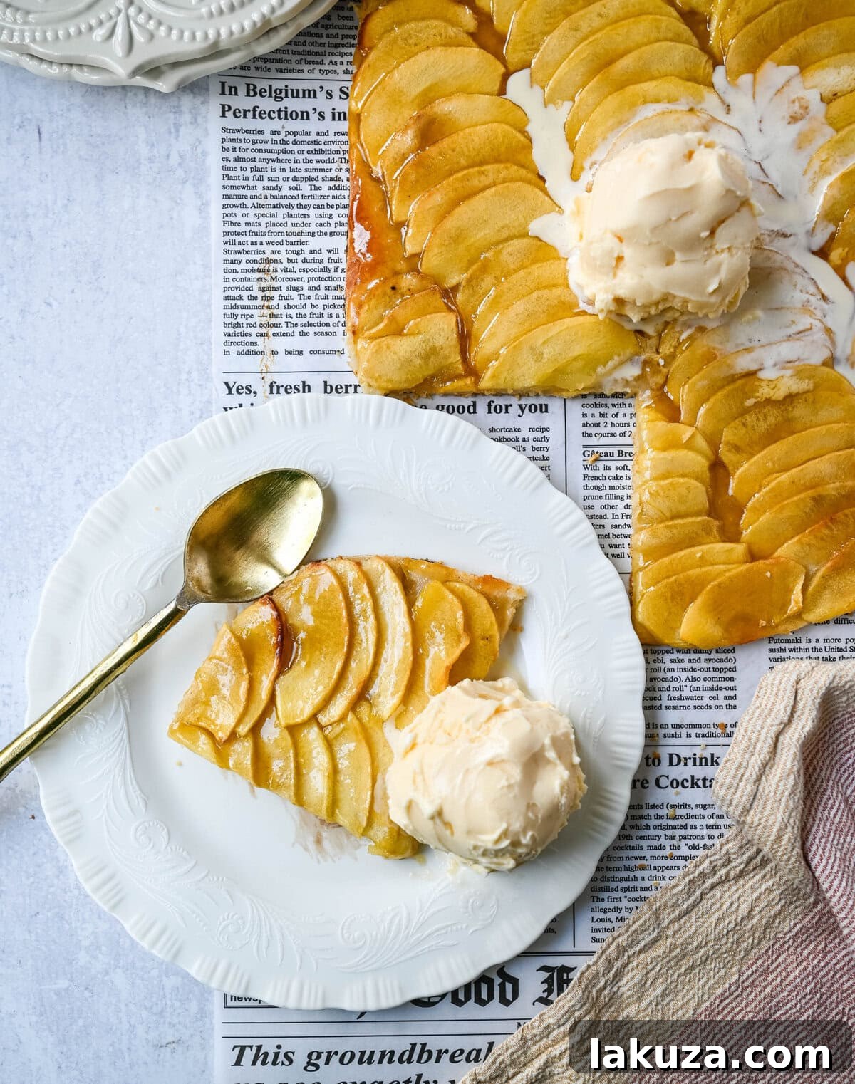 Classic French Apple Delight 5 Close-up of a slice of French Apple Tart with vanilla ice cream, ready to be served.