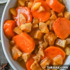 Tender sweet potatoes and apples layered in a silky butter and sugar sauce that thickens into a shiny glaze as it bakes. A timeless fall side dish everyone will love.