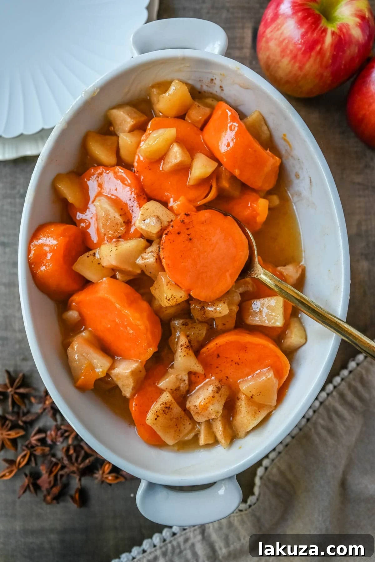 This Sweet Potatoes and Apples Recipe is mad with tender sweet potatoes and apples layered in a silky golden butter and sugar sauce that thickens into a glaze as it bakes. A timeless fall side dish everyone will love.