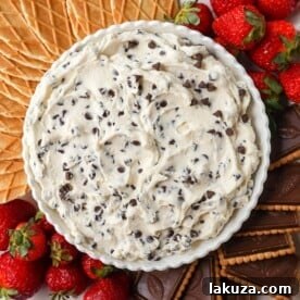 This is the Best Cannoli Dip Recipe made with ricotta cheese, mascarpone or cream cheese, powdered sugar, brown sugar, vanilla, and mini chocolate chips.
