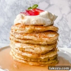 The BEST BUTTERMILK PANCAKES, a homemade recipe for light, fluffy, and tender buttermilk pancakes that melt in your mouth.