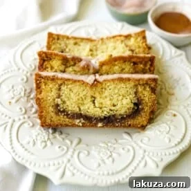 Soft and moist Cinnamon Swirl Quick Bread with cinnamon sugar streusel, perfect for sharing with neighbors and friends.