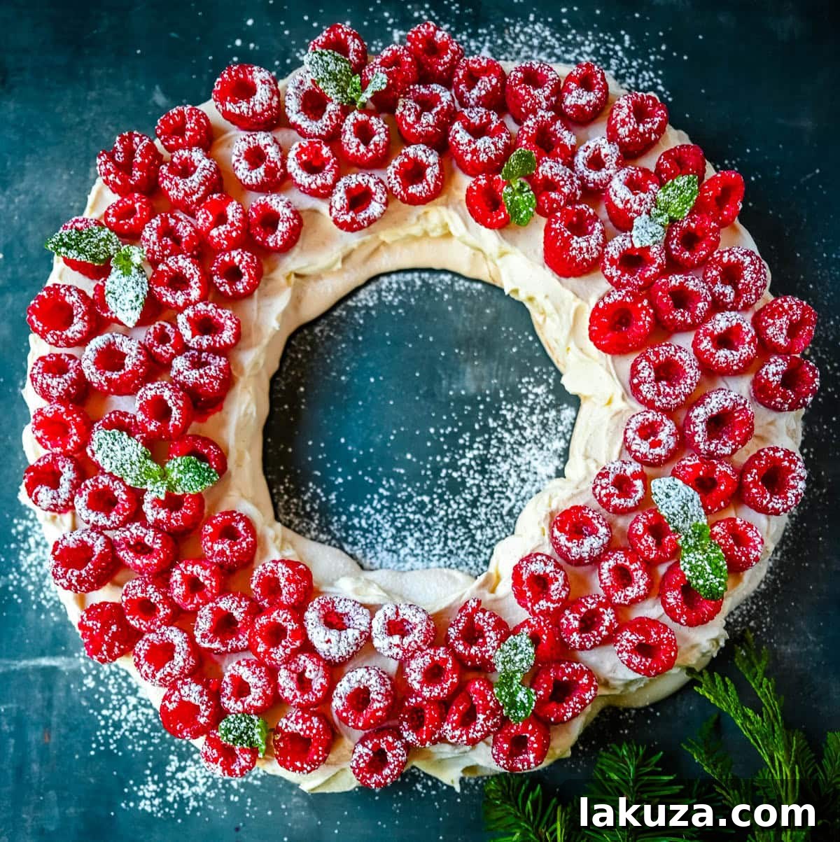 Festive Pavlova Cloud 5 A close-up of a slice of Christmas Pavlova, showing the layers of crisp meringue, soft center, and creamy topping.