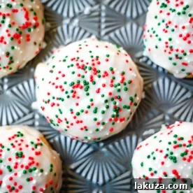 Italian ricotta cookies are one of the most popular Italian Christmas cookies, loved for their melt-in-your-mouth, soft texture. These holiday cookies are topped with a sweet glaze and colorful sprinkles, making them a perfect addition to any Christmas cookie platter. Ricotta cookies capture the flavor of classic Italian holiday baking. Whether you’re hosting a Christmas party or sharing homemade gifts, these easy Christmas cookies are guaranteed to stand out on every dessert table.