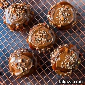 Chocolate Caramel Pecan Turtle Cookies made with a chewy chocolate cookie rolled in pecans and topped with caramel and melted chocolate. The best turtle cookie recipe!