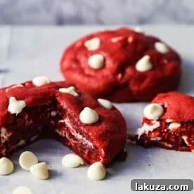 Red Velvet Cookies. Soft chewy famous Red Velvet Cookies with sweet white chocolate chips. www.modernhoney.com #redvelvet #redvelvetcookies #cookies #4thofJuly