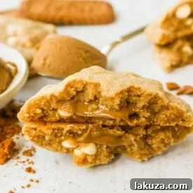 These Biscoff Cookies are filled with Biscoff cookie butter and white chocolate chips. You will love these soft, chewy cookies stuffed with caramelized cookie butter spread. 