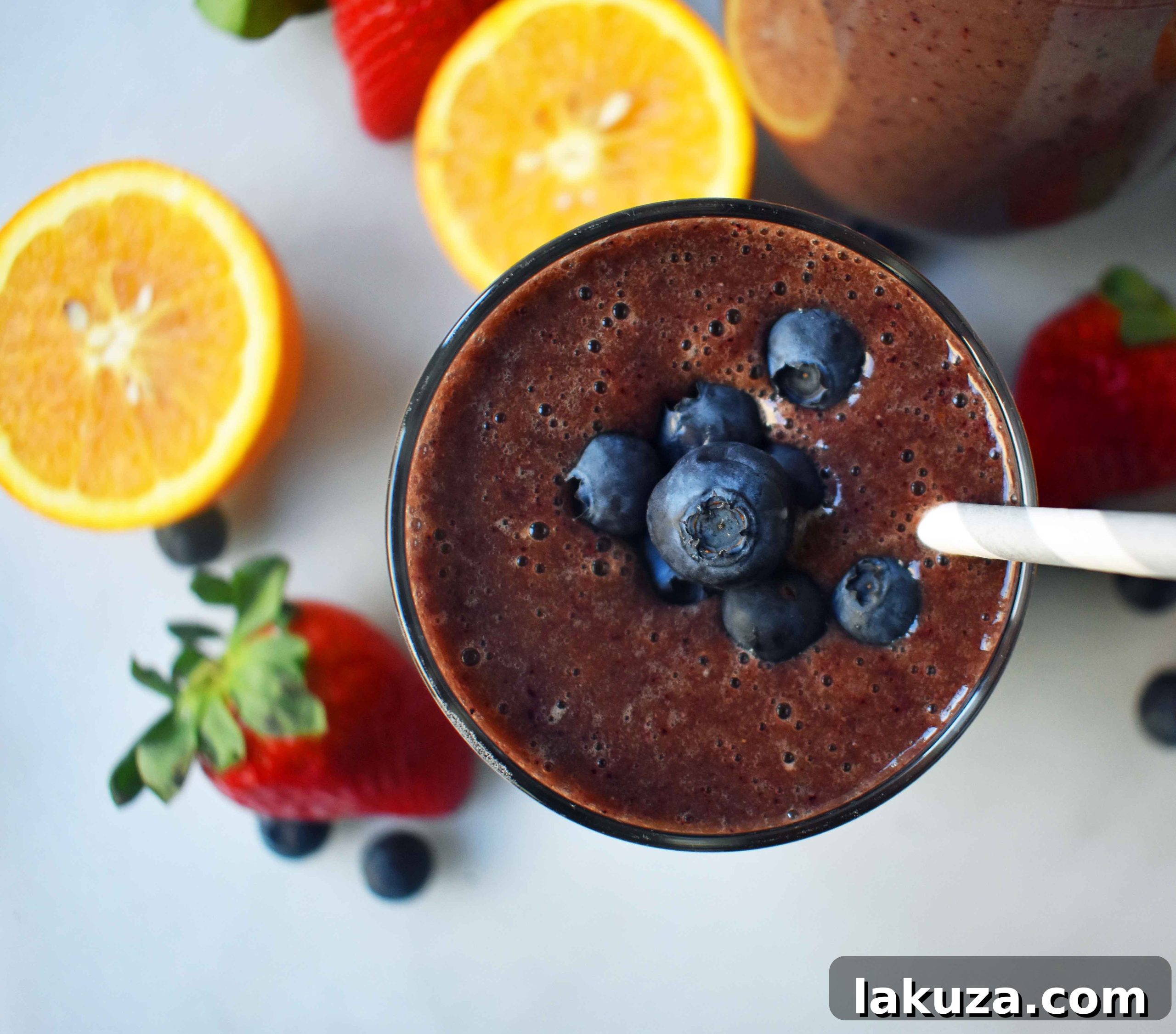 The Energizer Spinach Berry Smoothie: A vibrant blend of blueberries, strawberries, spinach, banana, and orange juice, perfectly crafted for a healthy, energizing start to your day. This delicious recipe from Modern Honey makes nutrition easy and enjoyable.