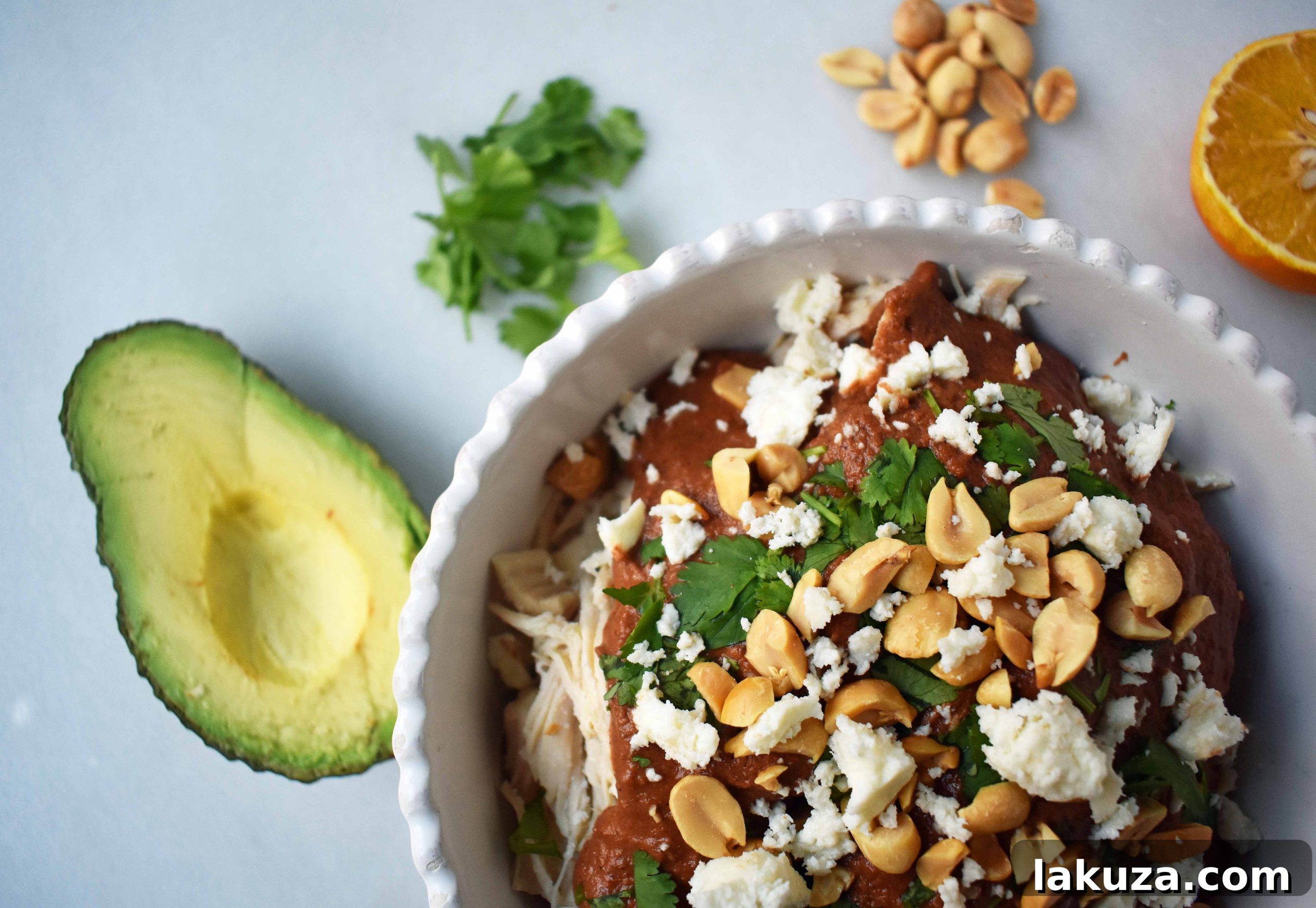 Crockpot Mexican Chicken Mole. Rich mole made easy in a slow cooker. Tender chicken covered in a rich, spiced, flavorful mole sauce. Can be made into chicken mole tacos by placing inside corn tortillas and topping with queso fresco, cilantro, white onion, and avocado. An easy crockpot dinner!