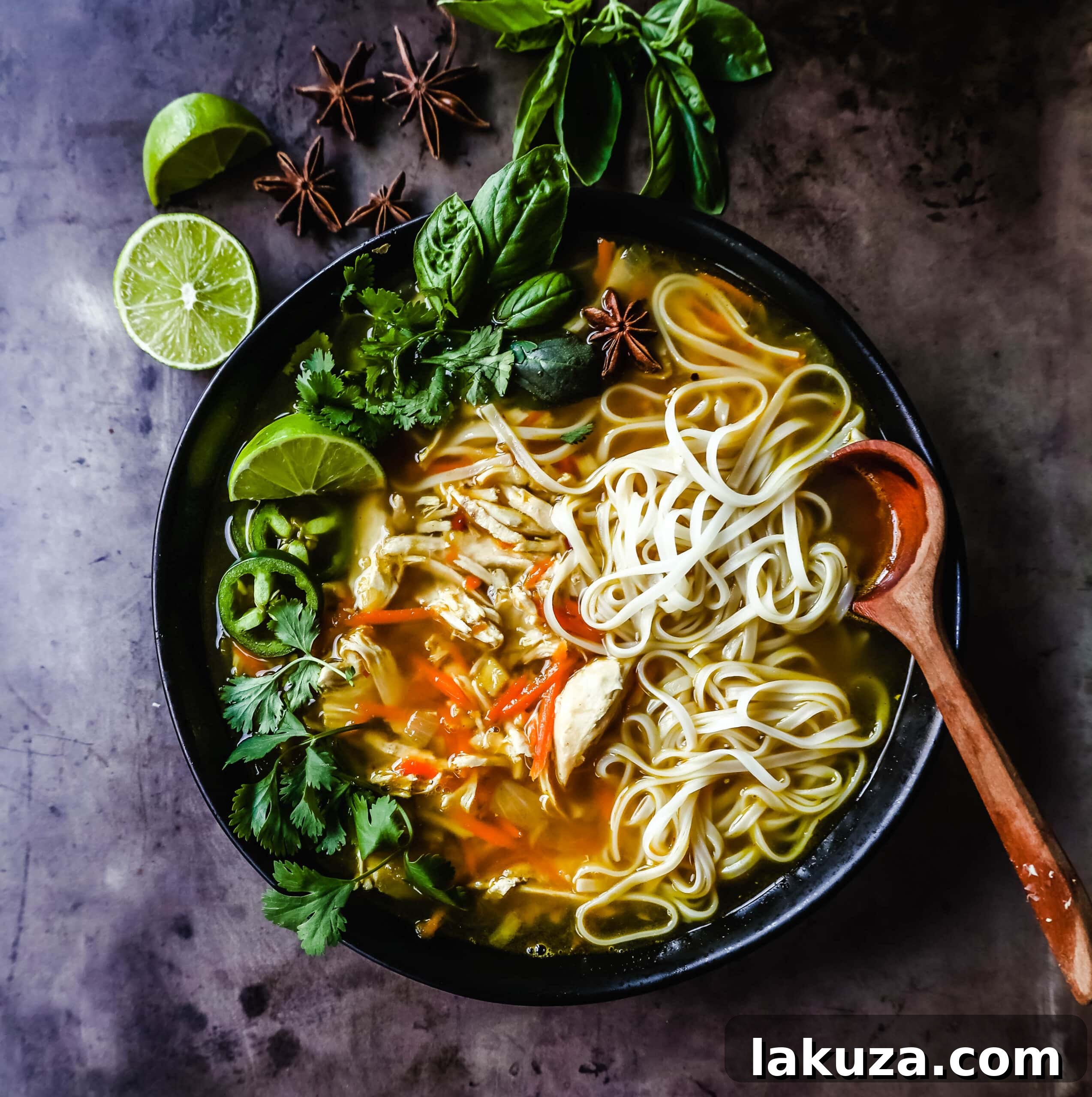 Quick and Easy Chicken Pho with tender chicken, warm broth, garlic, ginger, spices, fresh vegetables, and a touch of spice. This is a version of the popular Vietnamese Chicken Pho soup. Healthy and delicious homemade Pho.