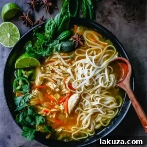 Quick and Easy Chicken Pho with tender chicken, warm broth, garlic, ginger, spices, fresh vegetables, and a touch of spice. This is a version of the popular Vietnamese Chicken Pho soup. Delicious and healthy homemade Pho.