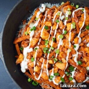 Buffalo Chicken Loaded Sweet Potato Fries 7 Buffalo Chicken Sweet Potato Fries, a vibrant and delicious loaded fries recipe.