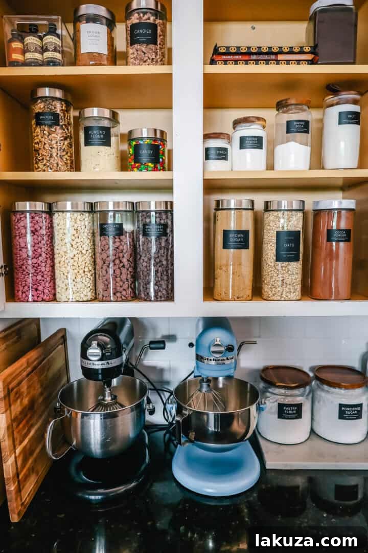 An overhead view of a diverse selection of baking ingredients, including various flours, sugars, and chocolate chips, ready for organization.