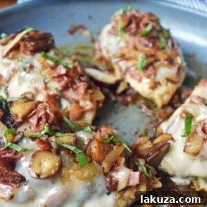 Finished Chicken Rosa Maria dish with melted cheese and fresh basil