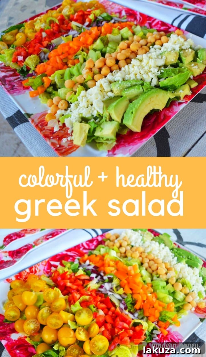 A Pinterest-optimized image for a Color Me Pretty Greek Salad recipe, featuring a vibrant mix of fresh vegetables, feta cheese, chickpeas, and avocado tossed in a Greek vinaigrette.