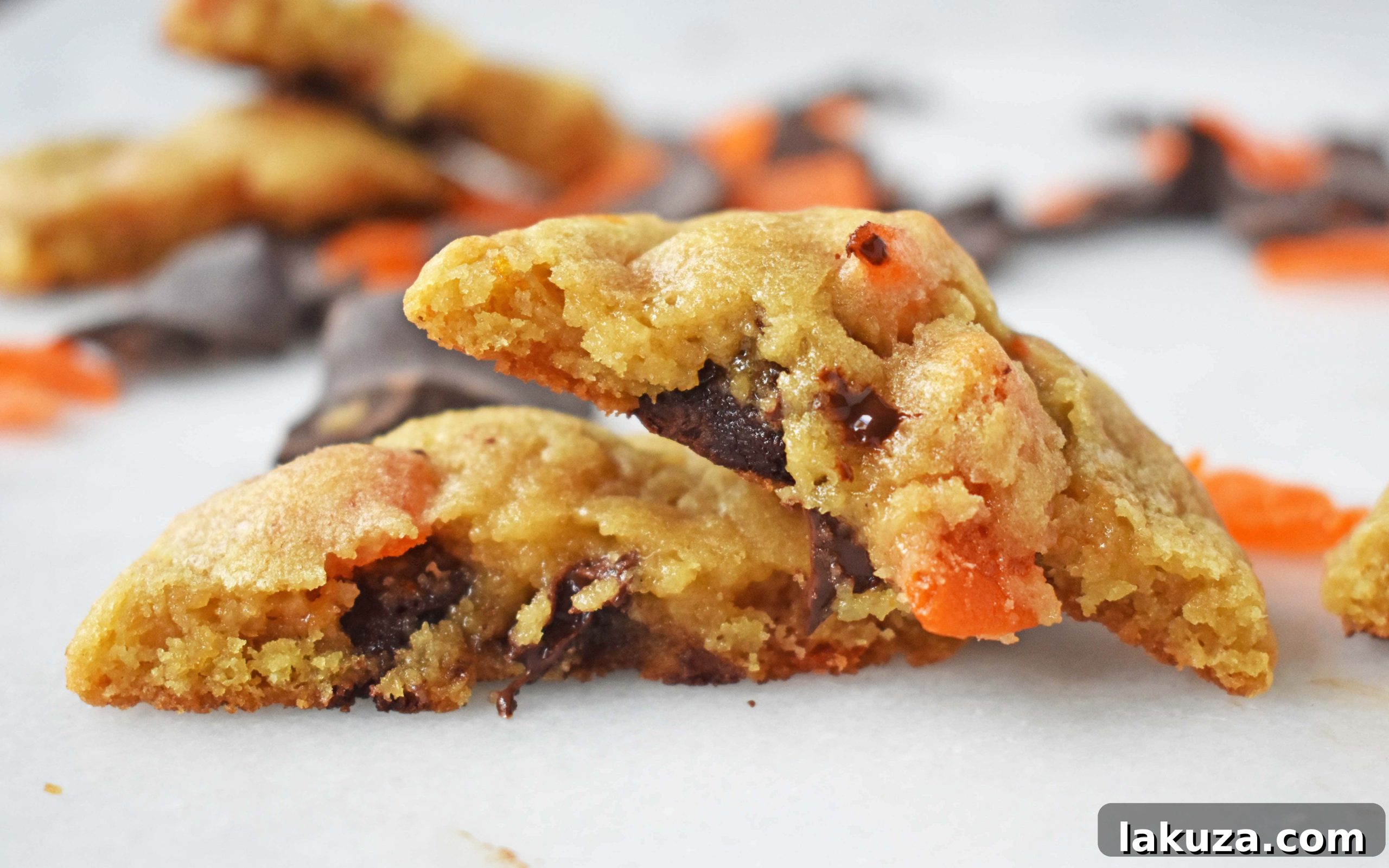 RubySnap Vivianna: Tropical Dark Chocolate Mango Cookies 5 An array of freshly baked RubySnap Vivianna copycat cookies, with visible pieces of dried mango and dark chocolate peeking through.