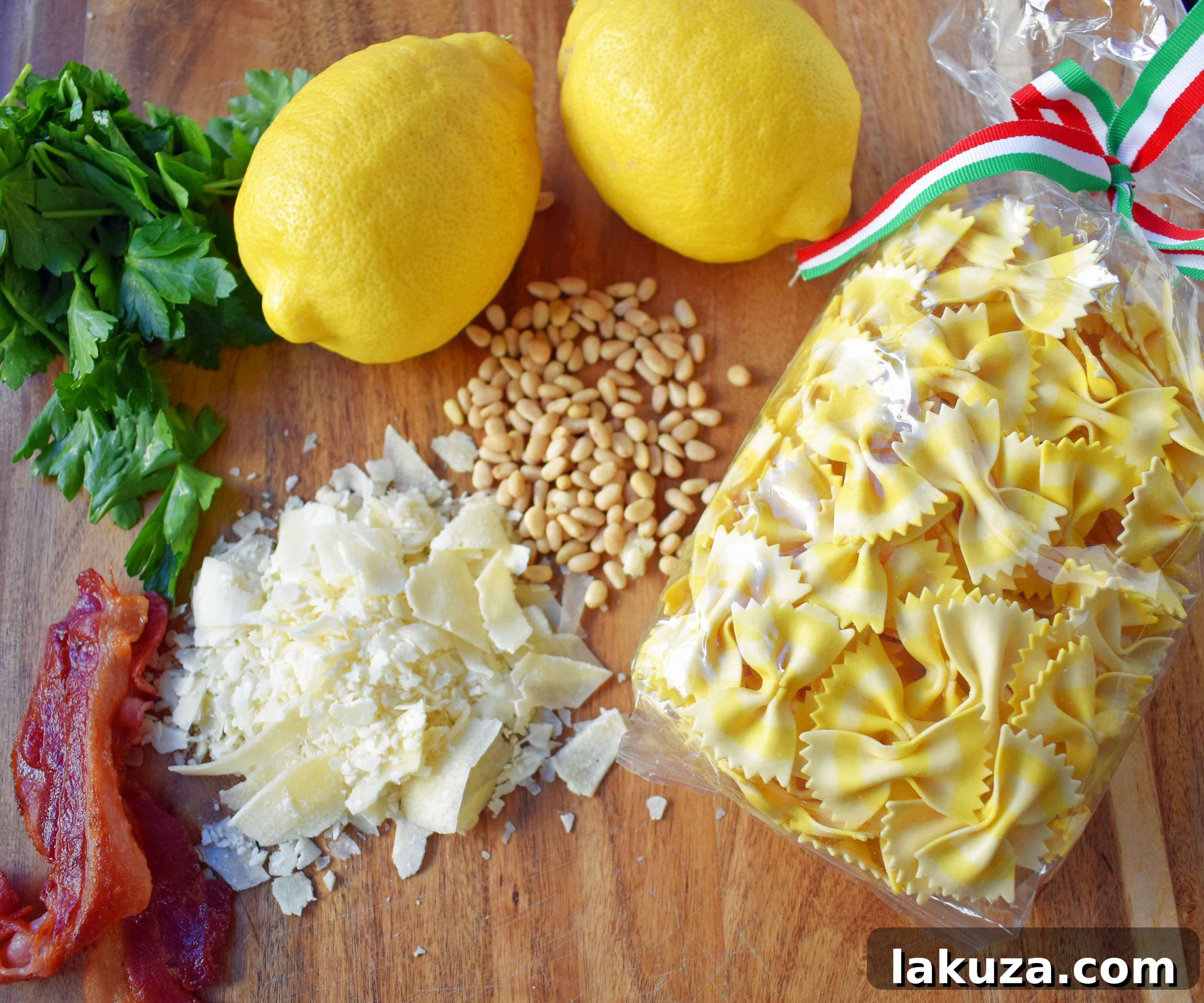 Bright Lemon Garlic Pasta with Crispy Bacon 3 Overhead shot of freshly prepared Lemon Garlic and Crispy Bacon Farfalle pasta, served in a rustic bowl. The golden pasta is coated in a glistening lemon-garlic sauce, accented by browned bacon bits, grated Parmesan, and whole pine nuts. It's a delectable and easy-to-make dish.