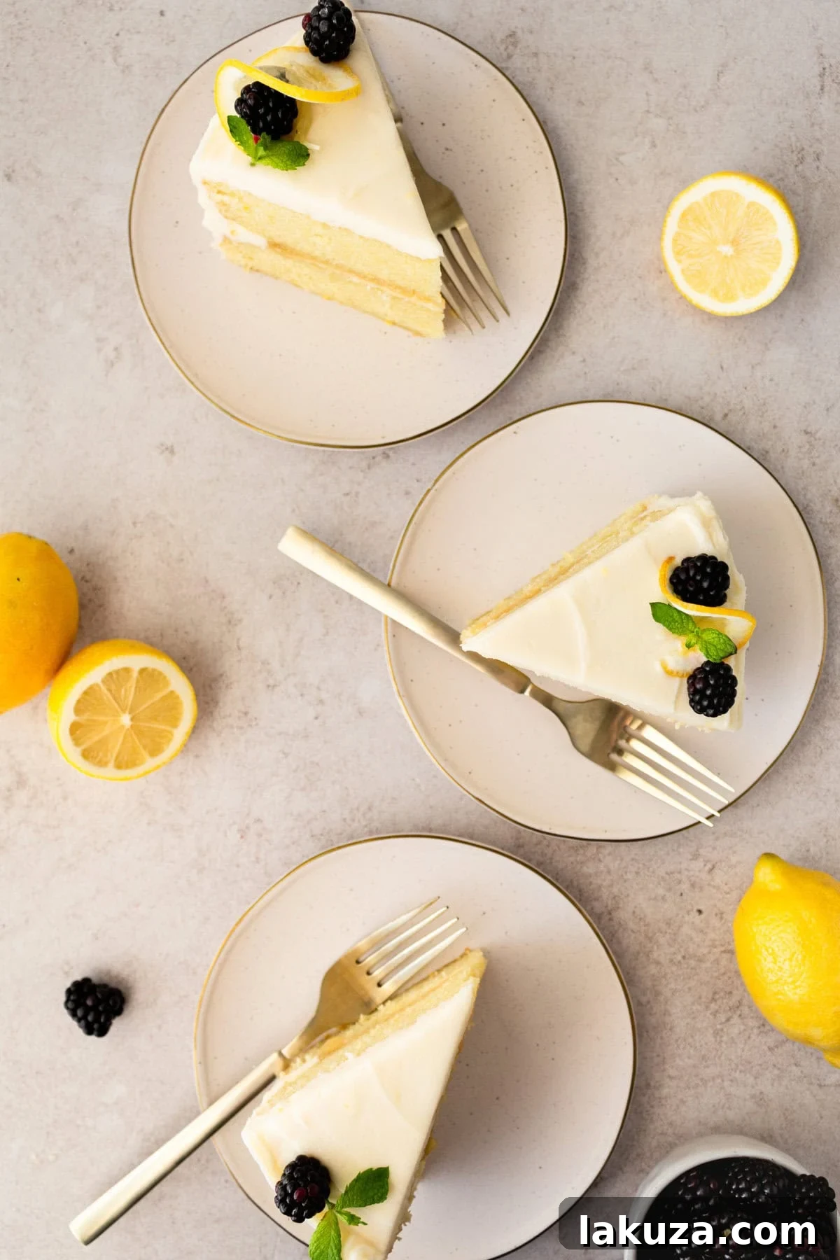 A close-up of a perfectly baked Lemon Olive Oil Cake, showcasing its golden-brown crust and inviting texture before frosting.