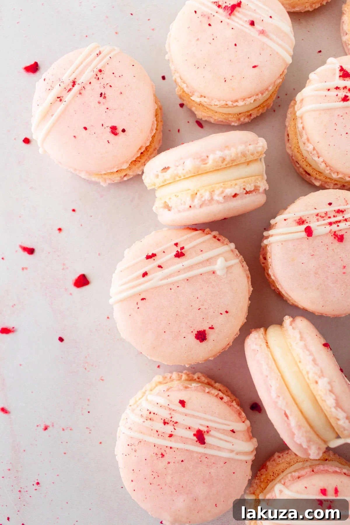 Elegant Macaron Delights 12 A variety of colorful French macarons filled with different creams and jams, ready to be enjoyed.