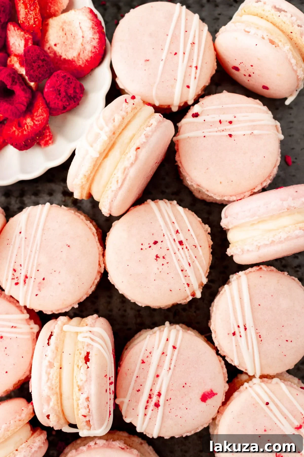 Elegant Macaron Delights 10 Close-up of perfectly baked French macarons with characteristic 'feet' and smooth shells, ready for filling.