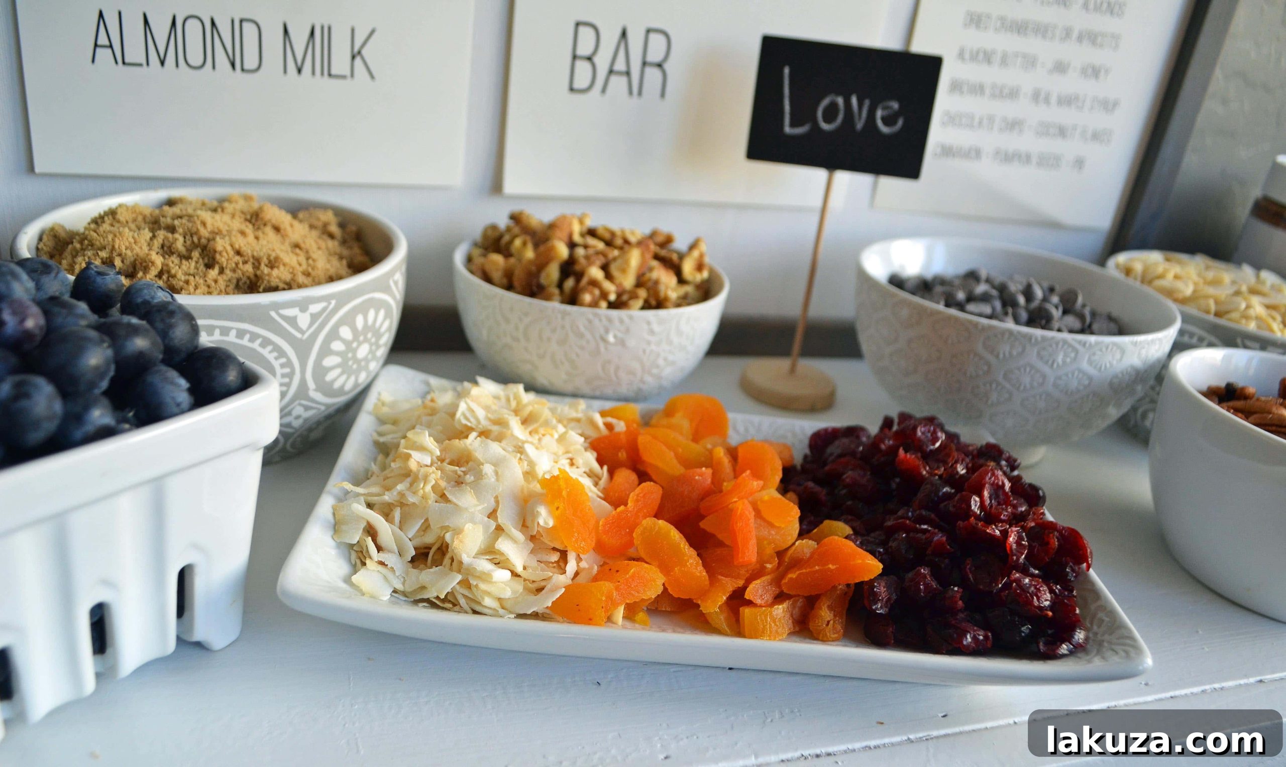 Craft Your Oat Creation 16 An overhead view of an elaborate oatmeal toppings bar, ready for guests to create their perfect bowl.